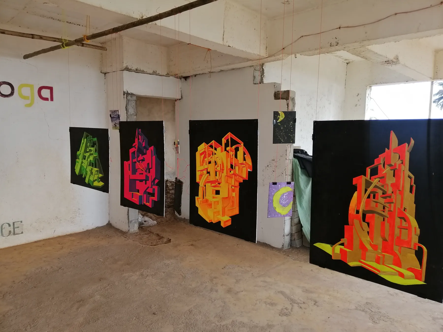 Exhibition view with paintings by Ilia Morozov
