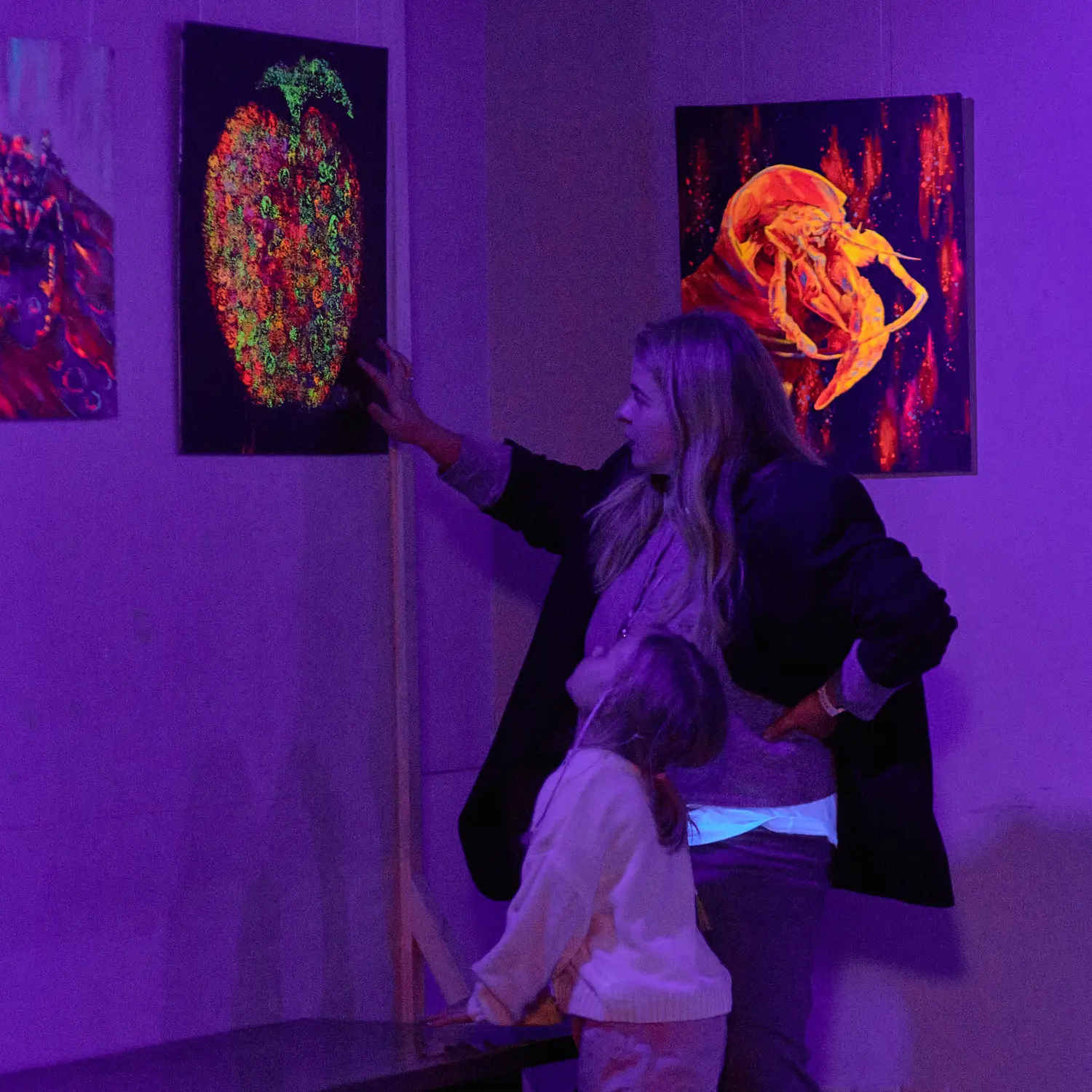 Exhibition view with paintings by Ilia Morozov